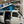 Charger l'image dans la galerie, Side view of VW Eurovan Winnebago with 3-window pop-top canvas installed