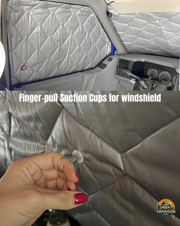 Person using finger-pull suction cups on a vehicle windshield with Vanagon logo.