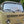 Charger l'image dans la galerie, Beige Volkswagen van with a clear windshield on a street
