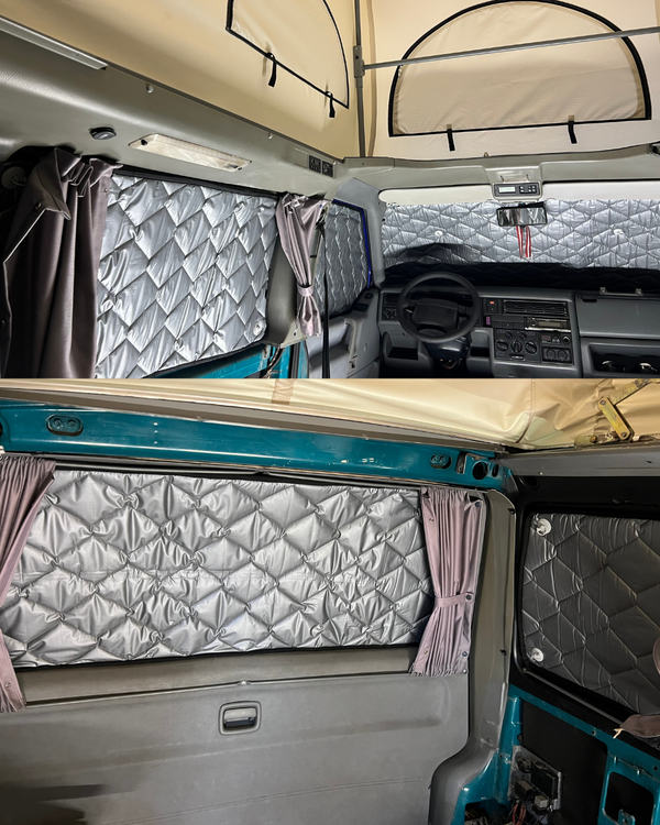 Interior of a van with insulation for windows and curtains